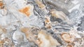 A close-up view of a polished agate stone surface showcasing intricate patterns in gray, white, and orange hues. The Royalty Free Stock Photo
