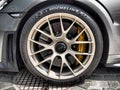 Close-up view of Porsche-front wheel with brakes