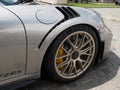 Close-up view of Porsche-front wheel with brakes