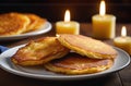 Close up view of potato pancakes. Potatoes pancakes latkes, flapjacks, hash brown or potato vada and candles on