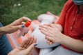 Close-up view of process of cleansing hands with sanitizer