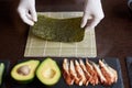 Process of preparing rolling sushi Royalty Free Stock Photo