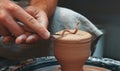 Close Up View of Professional Potter Making Clay Pot Stock Photo and Image