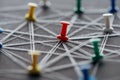 Close up view of push pins connected with strings isolated on grey, network concept. Royalty Free Stock Photo