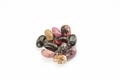 Close-up view of raw mixed beans on white background. Mix of pink, black, red and brown beans Royalty Free Stock Photo