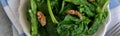 Close up view of raw spinach salad, vegetarian ingredient