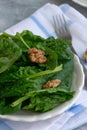 Close up view of raw spinach salad, vegetarian ingredient