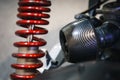 Close up view on rear shock absorber for a motorcycle. Rear view Royalty Free Stock Photo