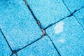 Close-up view rectangular paving stone concrete tile brick. Blue toned photo for design image background web screensaver