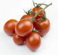 Close up view of red cherry tomatoes bunck on white background. Isolated tomatoes Royalty Free Stock Photo