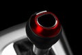 Close up view of a red gear lever shift. Manual gearbox. Car interior details. Car transmission. Soft lighting. Abstract view. Car Royalty Free Stock Photo