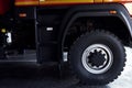 Close up view of red modern fire truck. Side part of vehicle Royalty Free Stock Photo