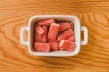 Close up view of red sugary candy on wooden background. Jelly sweets in a bowl. Royalty Free Stock Photo