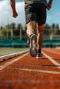 Close-up view of a runner exercising on an athletic stadium track