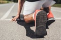 close up view of running shoes of male sprinter in starting position Royalty Free Stock Photo