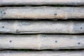 Close up view of a rustic old abandoned bamboo fence Royalty Free Stock Photo