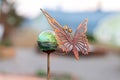Close up view of rusty butterfly outdoor garden ornate