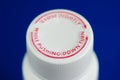 Close up view of a safety caps of a pill bottle Royalty Free Stock Photo