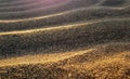 Close-Up of Wind-Rippled Sand Structure with Contrasting Evening Sun Shadows on Gran Canaria Royalty Free Stock Photo