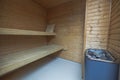 Close up view of sauna room interior. Wooden walls and seats. Royalty Free Stock Photo