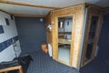 Close up view of sauna room interior. Wooden walls and seats. Health concept. Royalty Free Stock Photo