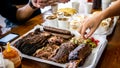 Close up view of the sausages, lamb meat and rib smoked barbecue on a food tray. Royalty Free Stock Photo