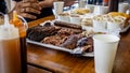 Close up view of the sausages, lamb meat and rib smoked barbecue on a food tray. Royalty Free Stock Photo
