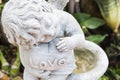 Close up view of a sculpture angel in garden Royalty Free Stock Photo
