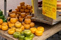 Close up view of a selection of delicious Gouda cheeses for sale at the city market