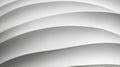 A close-up view of a series of overlapping, curved shapes in varying shades of gray.