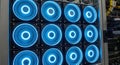 A close up view of a server rack with blue illuminated cooling fans showing the technology and infrastructure of data centers and Royalty Free Stock Photo