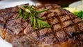 Close up view on serving of marinated grilled rib eye steak with baked potatoes and vegetables Royalty Free Stock Photo