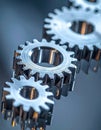 Precision Metal Gears Interlocking on a Reflective Surface Royalty Free Stock Photo