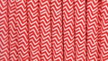 a close up view of several paper drinking straws featuring a red and white chevron zigzag pattern Royalty Free Stock Photo