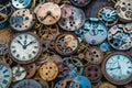 Close-up view of several retro rusty watch mechanisms