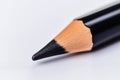 CloseUp View of a Sharp Black Pencil Point on a White Background Royalty Free Stock Photo