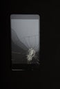 Close-up view of Shattered smartphone screen