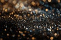 A close-up view of shimmering bokeh lights on a dark surface at night