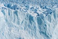 Close up view of shining white blue huge glacier freeze ice in sunny day at Perito Moreno glacier in Los Glaciares National Park,