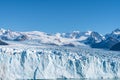 Close up view of shining white blue huge glacier freeze ice in sunny day at Perito Moreno glacier in Los Glaciares National Park,