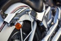 Close up view of a shiny chrome motorcycle design engine with bl