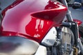 Close up view of a shiny chrome motorcycle design engine with ex