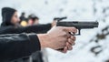 Close-up view of shooter practice handgun shooting in row group