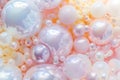Close-up view shows different sizes of round, shiny spheres with varying colors closely packed together. The surface reflects Royalty Free Stock Photo