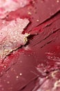A close-up view shows a rich crimson velvet texture with hints of gold shimmer. The surface reflects light softly, adding depth Royalty Free Stock Photo