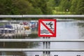 Close-up view of sign prohibited diving from bridge. Royalty Free Stock Photo
