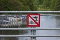 Close up view of sign prohibiting diving to water. Royalty Free Stock Photo