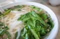 Close-up view of a simple but delicious bowl of rice noodles in hot clear broth Royalty Free Stock Photo