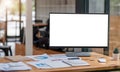 Close up view of simple workspace with open blank screen laptop, frame and notebook on white table with blurred office room Royalty Free Stock Photo