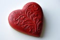 A close-up view of a single red heart-shaped cookie, perfect for Valentine's Day Royalty Free Stock Photo